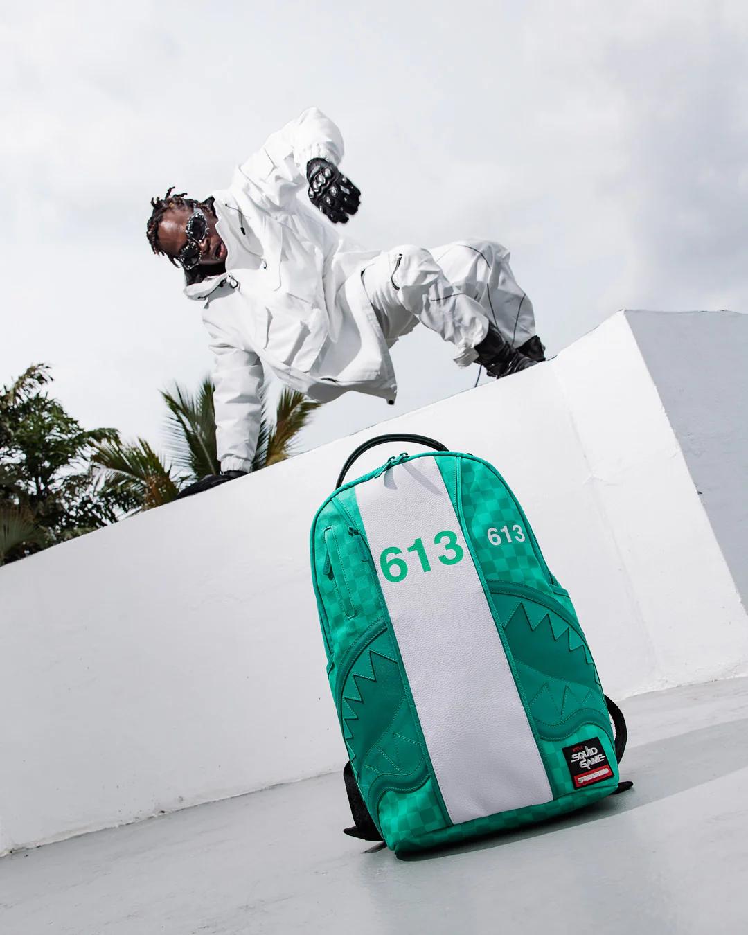 SQUID GAME COLLAB JUMPSUIT BACKPACK | Sprayground New