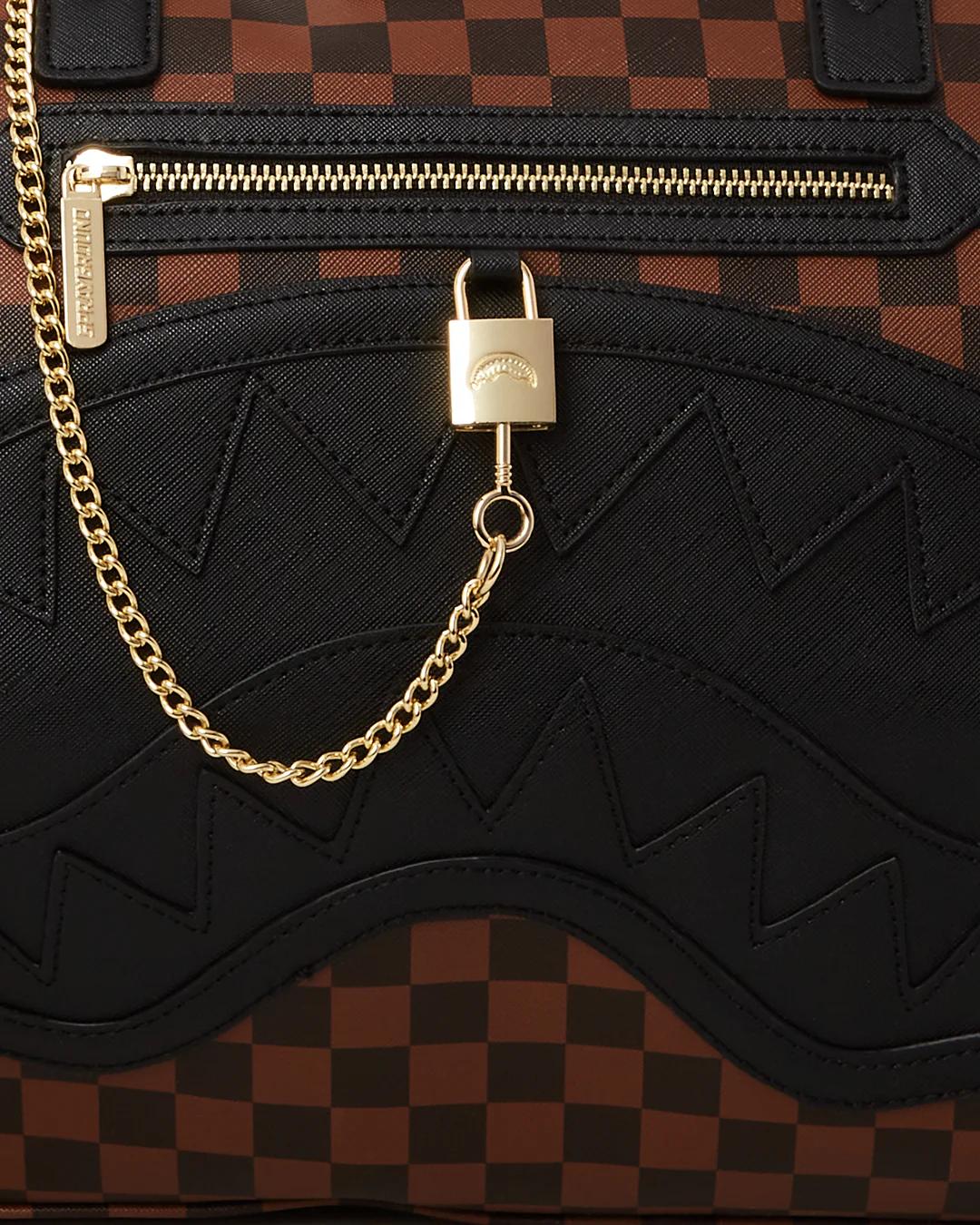 HENNY LOCK SHARKS IN PARIS DUFFLE | Sprayground Trending