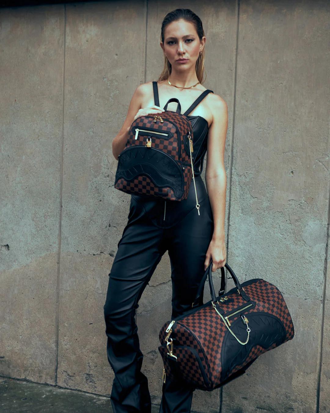 HENNY LOCK SHARKS IN PARIS DUFFLE | Sprayground Trending