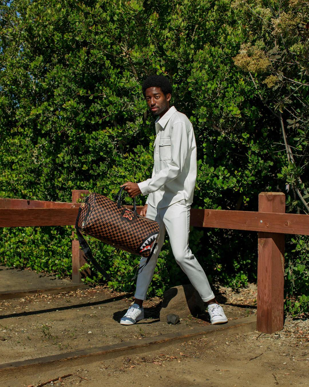SHARKS IN PARIS UNSTOPPABLE DUFFLE | Sprayground Recommended