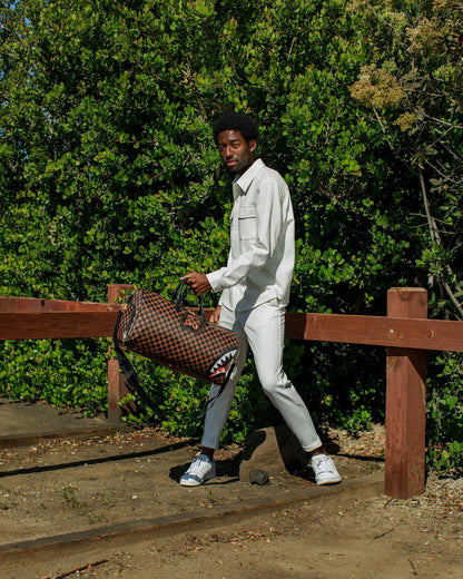 SHARKS IN PARIS UNSTOPPABLE DUFFLE | Sprayground Recommended