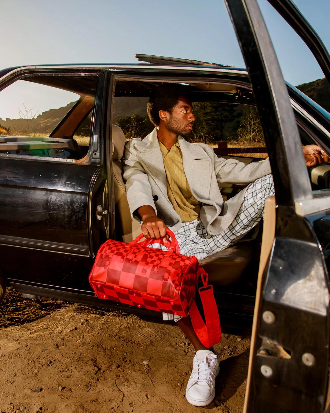 XTC SHARKS IN WONDERLAND MINI DUFFLE | Sprayground Essential
