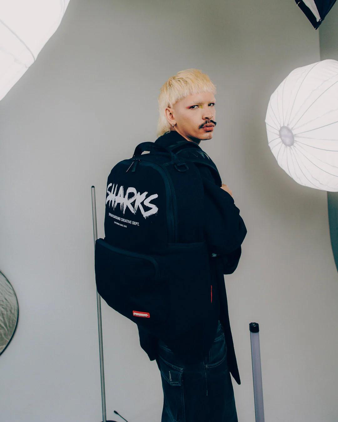SHARKS CREATIVE DEPT CARGO HERO BACKPACK | Sprayground Featured