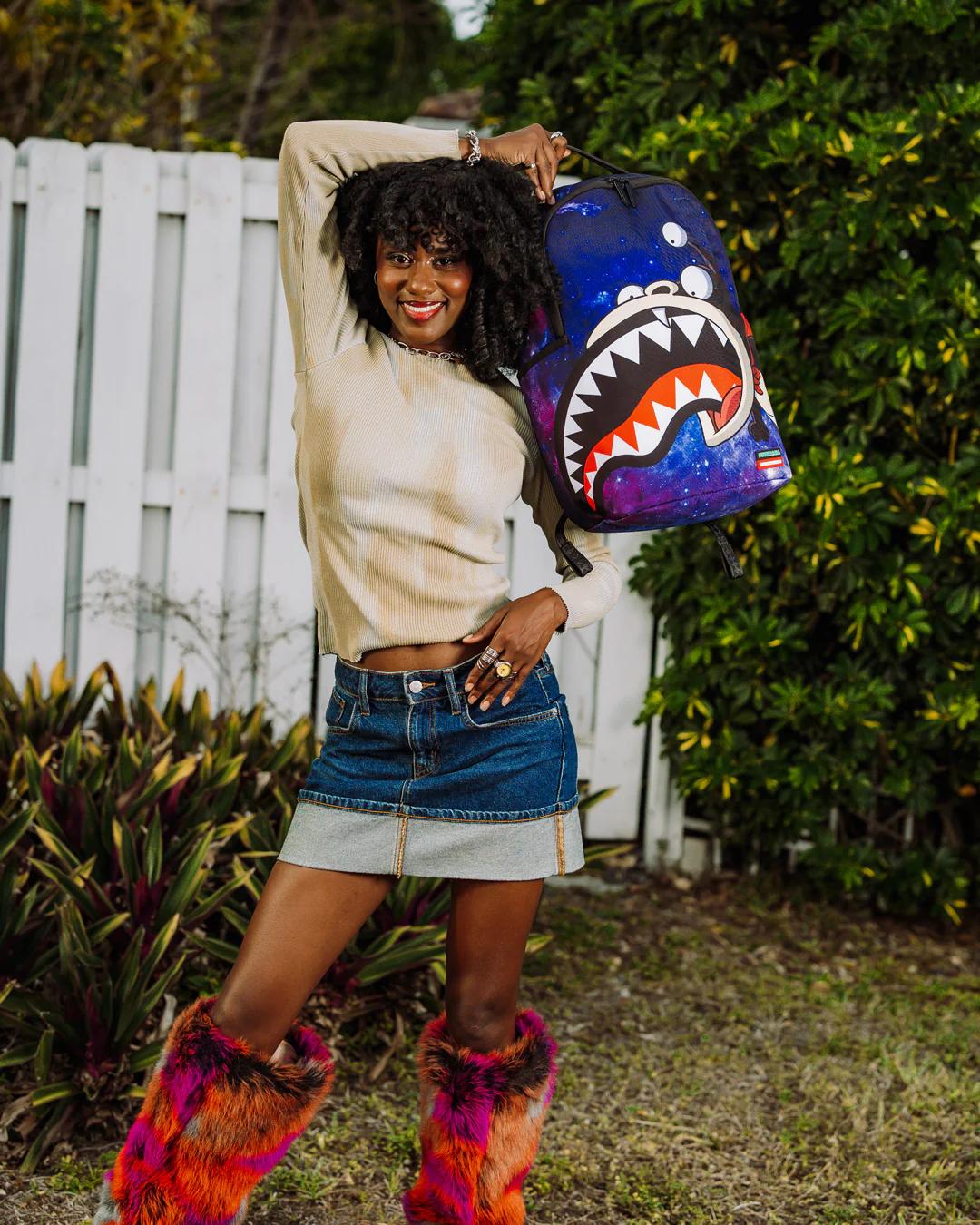 FUTURAMA NIBBLER EAT SHARK DLXR BACKPACK | Sprayground Featured