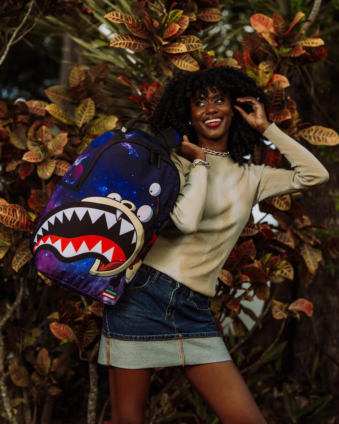 FUTURAMA NIBBLER EAT SHARK DLXR BACKPACK | Sprayground Featured