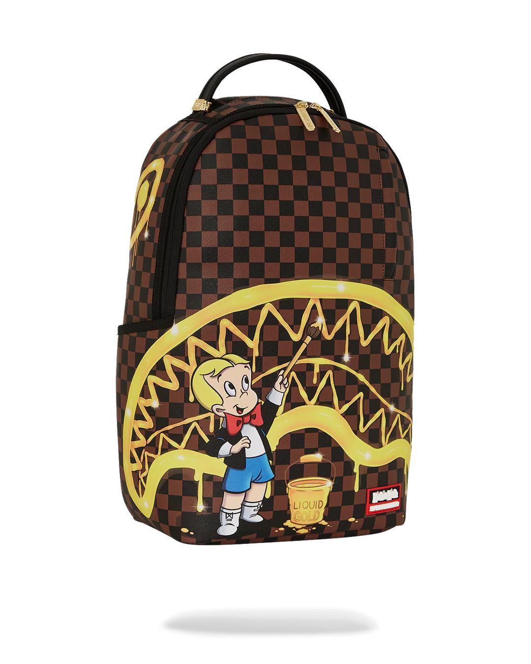 RICHIE RICH PAINT THE SHARK GOLD BACKPACK | Sprayground Best Seller