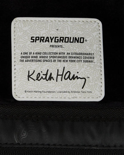 KEITH HARING BIG BLUE PURSE ART BACKPACK | Sprayground Exclusive