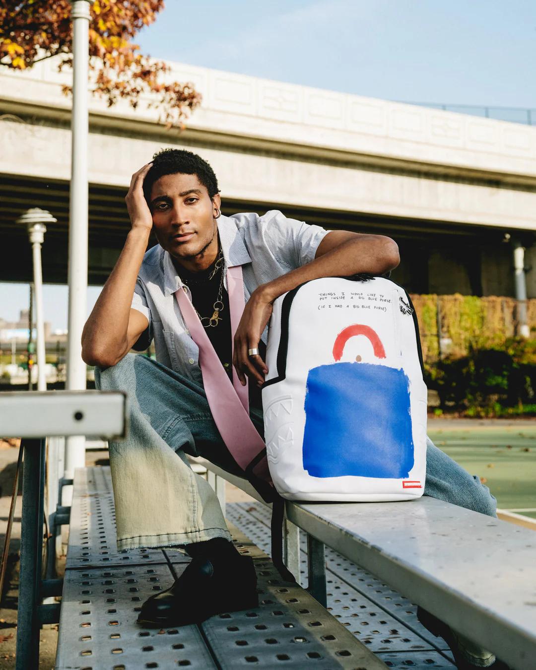 KEITH HARING BIG BLUE PURSE ART BACKPACK | Sprayground Exclusive