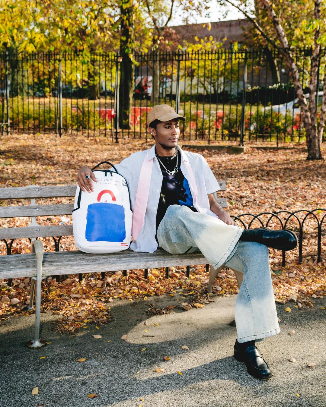 KEITH HARING BIG BLUE PURSE ART BACKPACK | Sprayground Exclusive