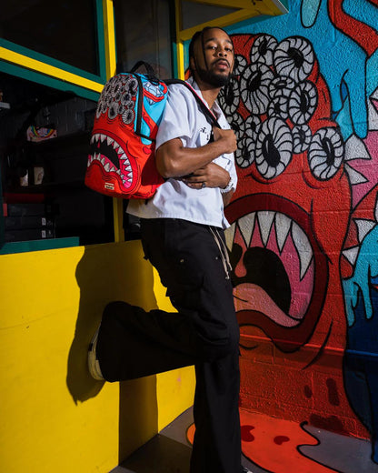JORGE RODRIGUEZ THE ARTIST COLLAB BLINKY SHARK BACKPACK | Sprayground Best Seller