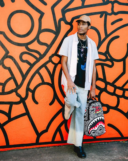 KEITH HARING SKATER SHARK DLXSR BACKPACK | Sprayground Recommended